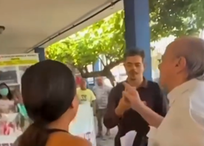 Sílvio Mendes discutindo com manifestantes