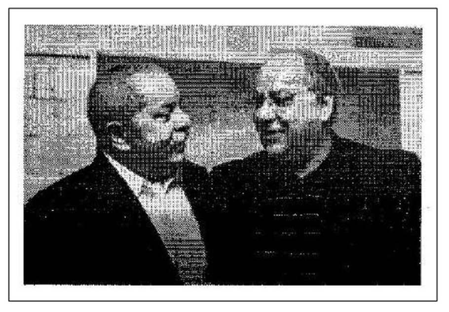 Esta imagem em preto e branco, que mostra Lula e Duque, foi anexada pela defesa do ex-diretor